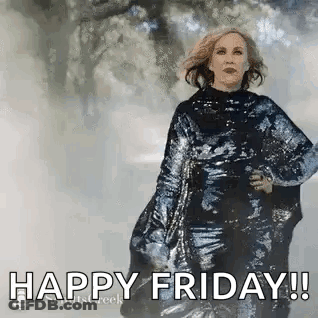 Woman In Sequined Dress Saying Happy Friday GIF