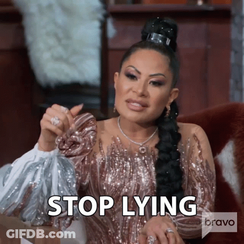 Woman In Sequined Dress Saying Stop Lying Holding Purse GIF