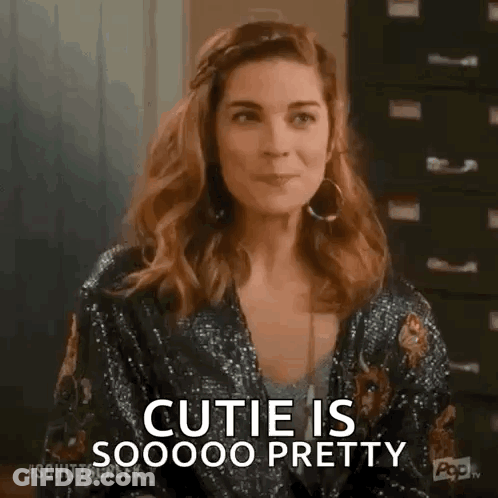 Woman In Sequined Jacket Says Cutie Is Soooo Pretty GIF