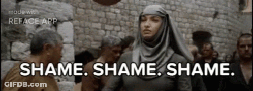 Woman In 'Shame' Shirt In Front Of Man GIF