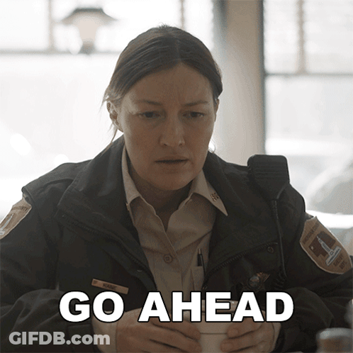 Woman In Sheriff Uniform Holding Coffee Saying Go Ahead GIF