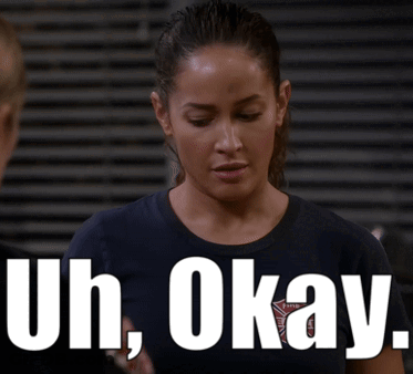 Woman In Shirt Saying Uh Okay GIF