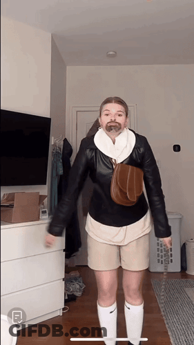 Woman In Shorts And Knee High Socks GIF