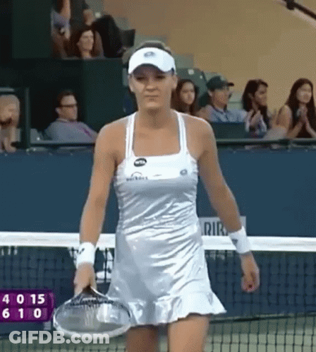 Woman In Silver Dress Holding Tennis Racket GIF