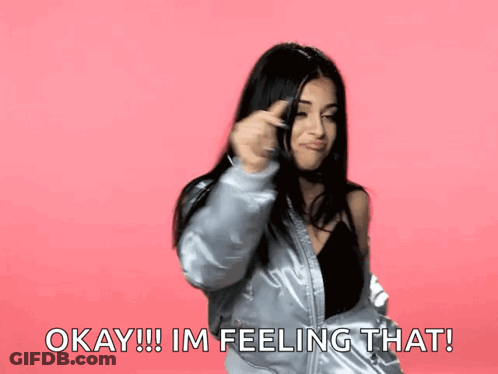 Woman In Silver Jacket Says Okay I'm Feeling That GIF