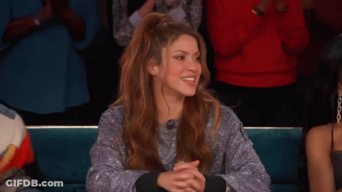 Woman In Silver Sweater Clapping In Crowd GIF