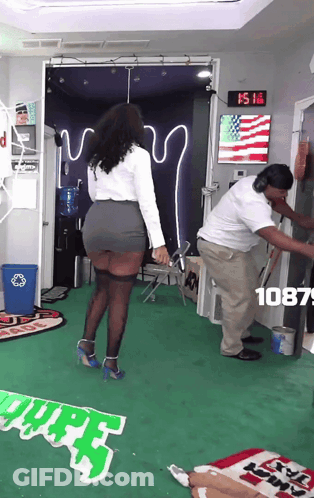 Woman In Skirt Standing Next To Man In White Shirt 1087 Sign GIF