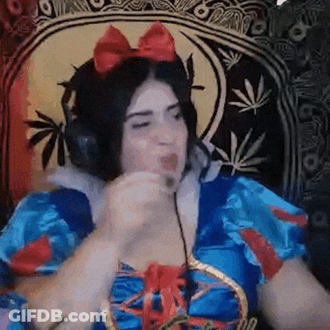 Woman In Snow White Costume Wearing Headphones Eating GIF