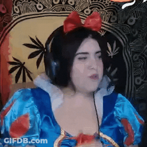Woman In Snow White Costume With Headphones And Red Bow GIF