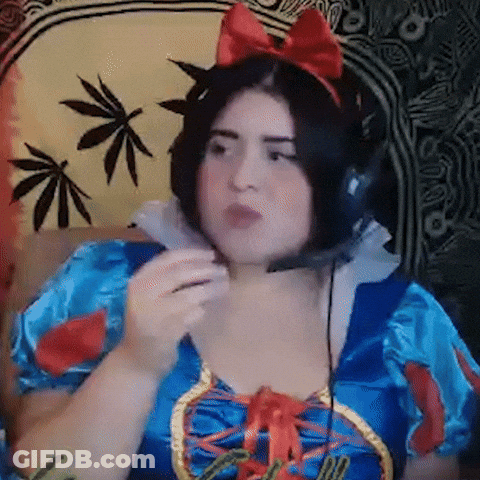 Woman In Snow White Costume With Headphones On Couch GIF