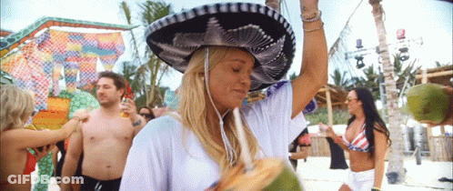 Woman In Sombrero Holding Coconut GIF