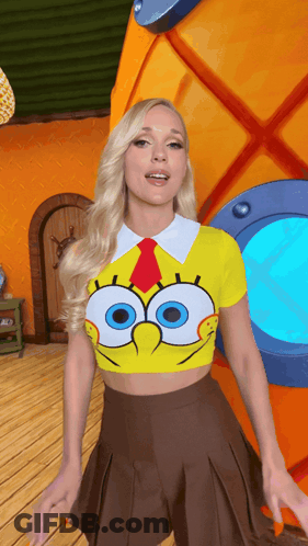 Woman In SpongeBob Shirt And Tie In Front Of SpongeBob House GIF