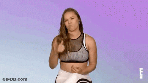 Woman In Sports Bra Giving Thumbs Up GIF