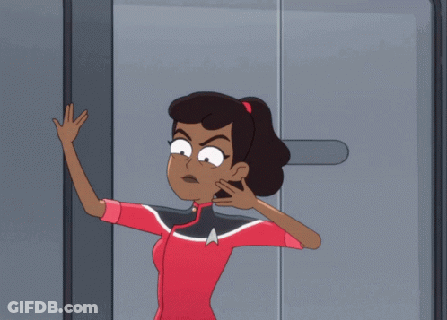 Woman In Star Trek Uniform In Doorway GIF