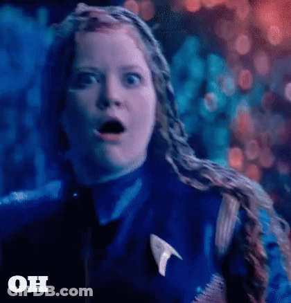 Woman In Star Trek Uniform Surprised Saying Oh GIF