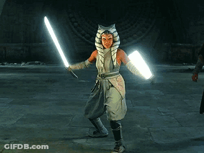 Woman In Star Wars Costume Holding Lightsaber GIF