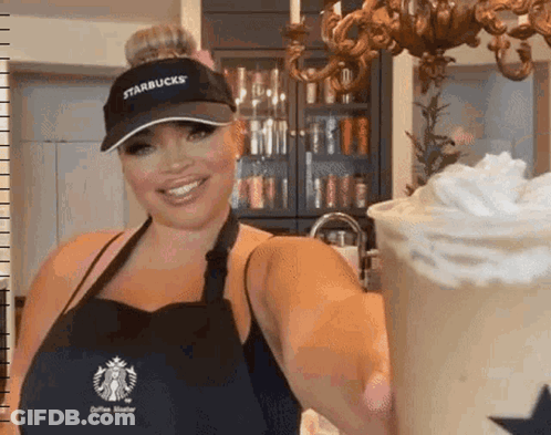 Woman In Starbucks Hat Holding Drink GIF
