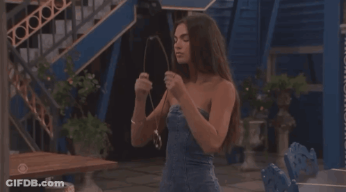 Woman In Strapless Denim Dress With Necklace GIF