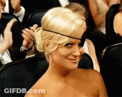 Woman In Strapless Dress And Black Eye Patch GIF