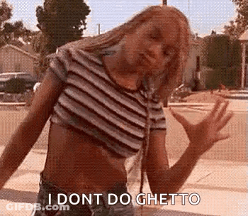 Woman In Striped Crop Top And Shorts With Hands Outstretched GIF