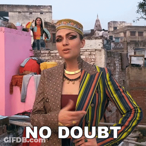 Woman In Striped Jacket And Hat Saying No Doubt GIF