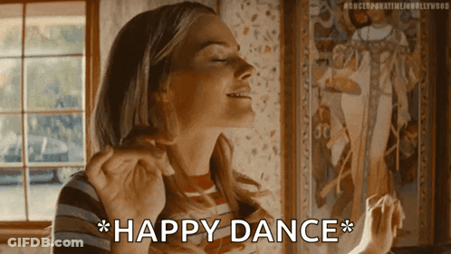 Woman In Striped Shirt Happy Dance GIF