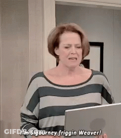 Woman In Striped Shirt Holding Laptop GIF
