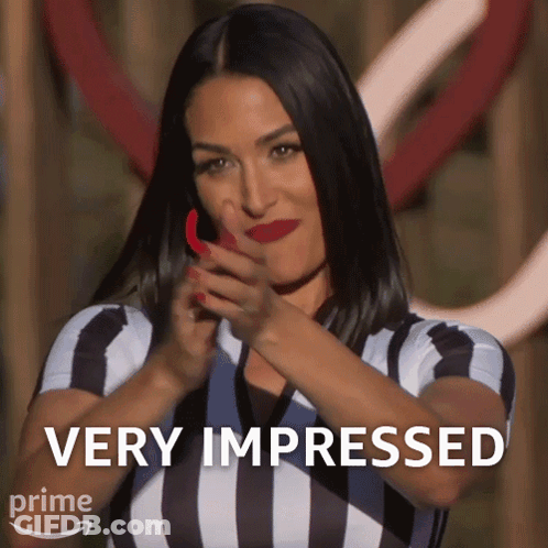 Woman In Striped Shirt Impressed GIF