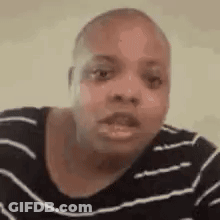 Woman In Striped Shirt Making Funny Face GIF