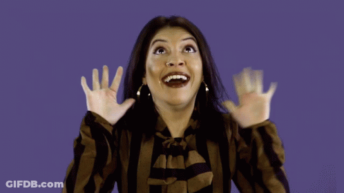 Woman In Striped Shirt Making Funny Face GIF