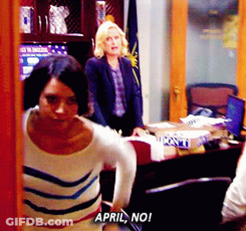 Woman In Striped Shirt Saying April No GIF