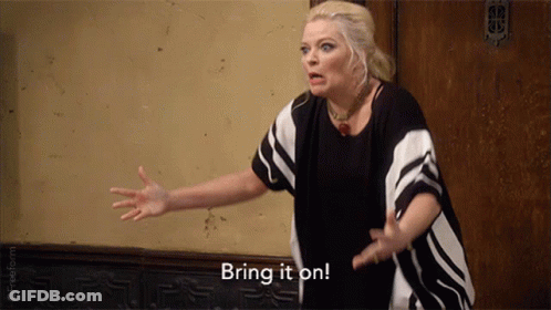 Woman In Striped Shirt Saying Bring It On GIF
