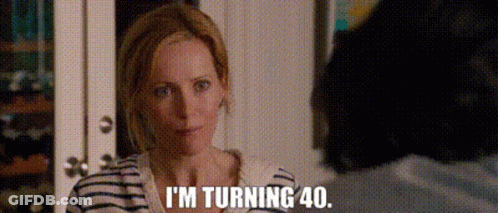 Woman In Striped Shirt Saying I'm Turning 40 GIF