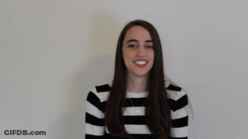 Woman In Striped Shirt Saying Love GIF
