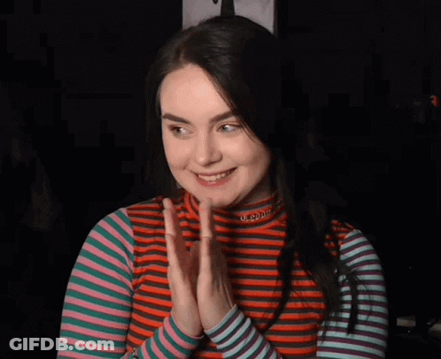 Woman In Striped Shirt Saying Utopia GIF