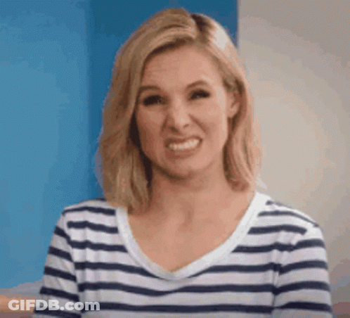 Woman In Striped Shirt Smiling Funny Face GIF