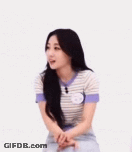 Woman In Striped Shirt Smiling Sitting GIF