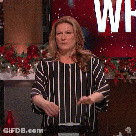 Woman In Striped Shirt Standing Before WP Screen GIF