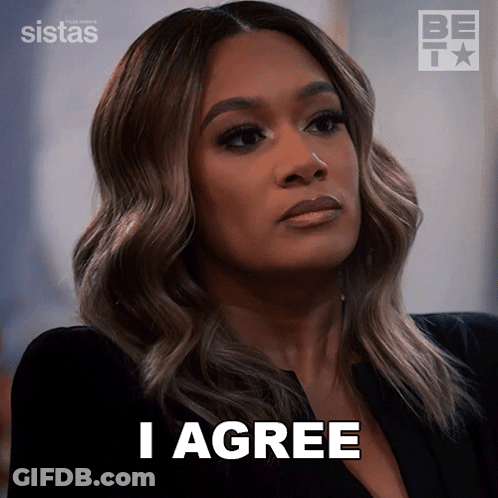 Woman In Striped Shirt Vest Looking At Another GIF