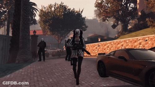 Woman In Striped Shirt Walking Down Street GIF
