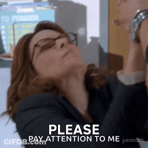 Woman In Suit And Glasses Talking On Cell Phone GIF