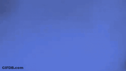 Woman In Suit And Hat GIF
