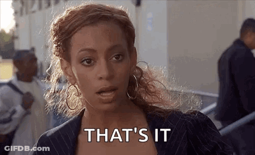 Woman In Suit And Hoop Earrings Saying That's It GIF