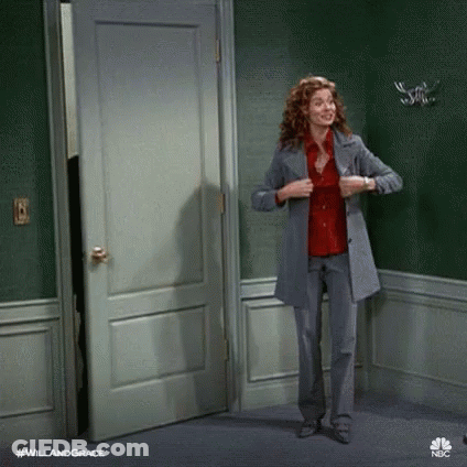 Woman In Suit And Red Shirt GIF