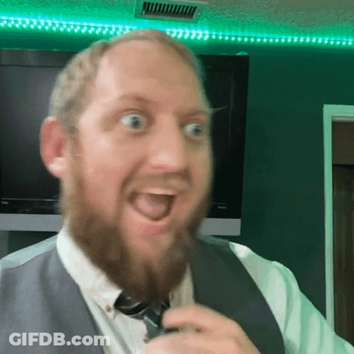 Woman In Suit And Tie Before Ladder GIF