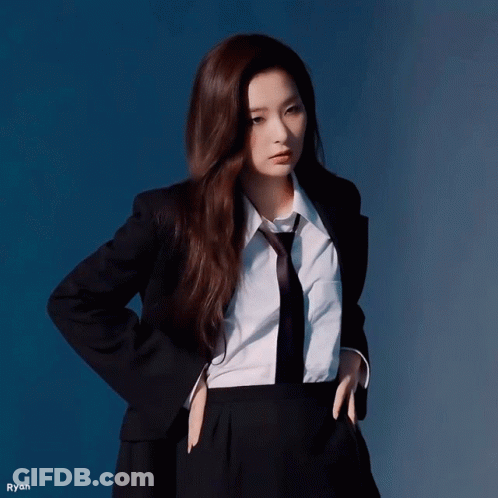 Woman In Suit And Tie Hands In Pockets Ryan GIF