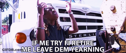Woman In Suit And Tie Looking In Mirror Saying Voyo GIF