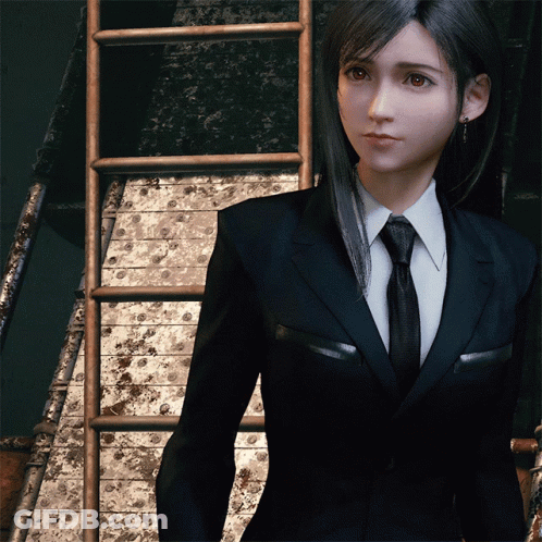 Woman In Suit And Tie Next To Ladder GIF