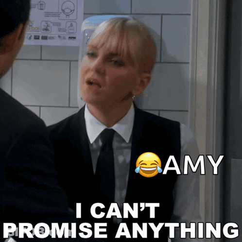 Woman In Suit And Tie Saying I Can't Promise Anything GIF