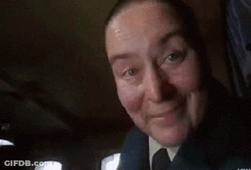 Woman In Suit And Tie Smiling GIF